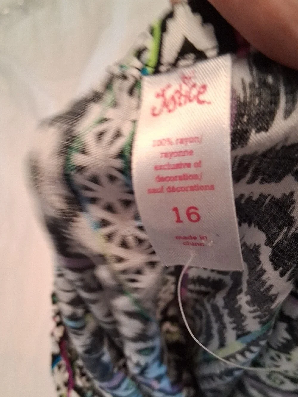 NWOT Girls' Size 16 Black Patterned One-Piece Romper with Green & Purple Accents